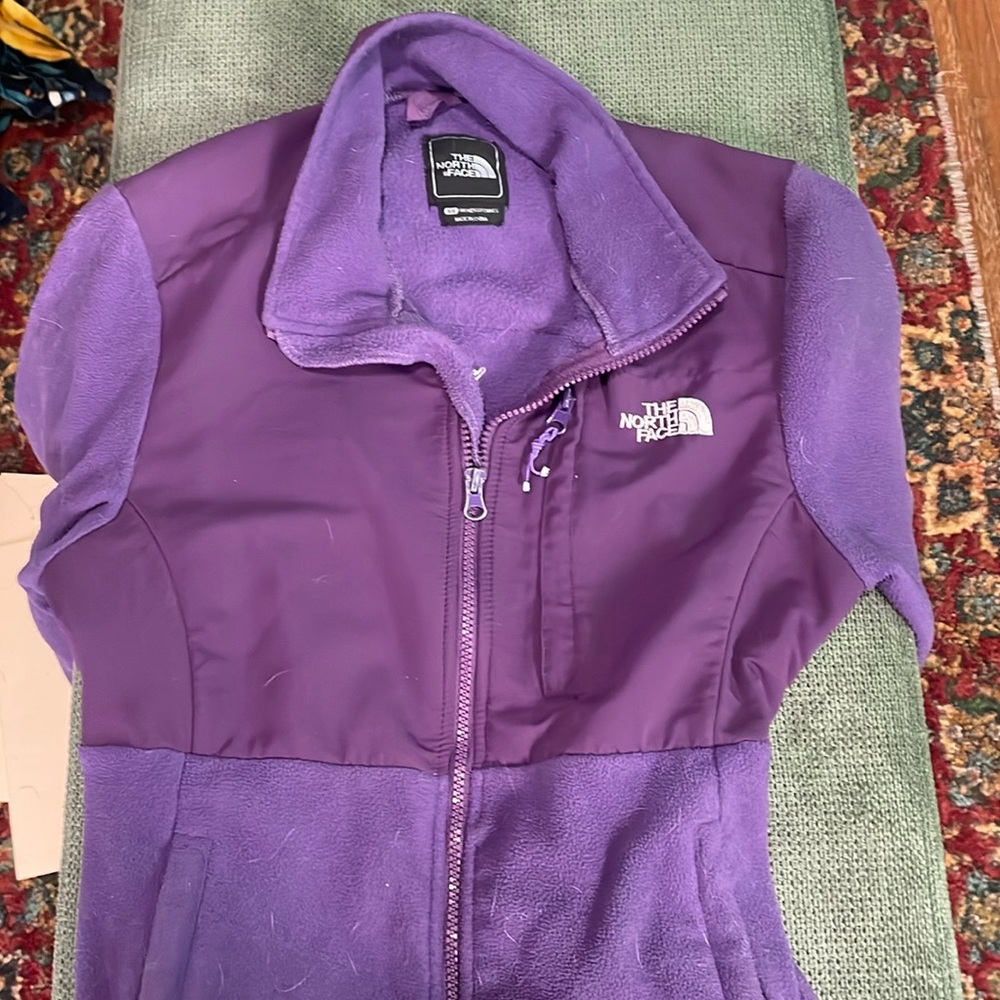 The North Face Purple Small Jacket. Holes in pockets